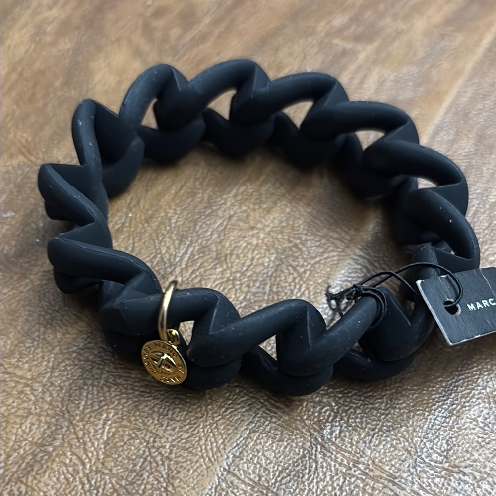 Marc Jacob’s Black Chunky Bracelet with Gold Charm